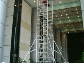 廣州租售廠房消防吊頂專用電動(dòng)剪叉式液壓升降平臺(tái)與附著式升降腳手架應(yīng)用指南